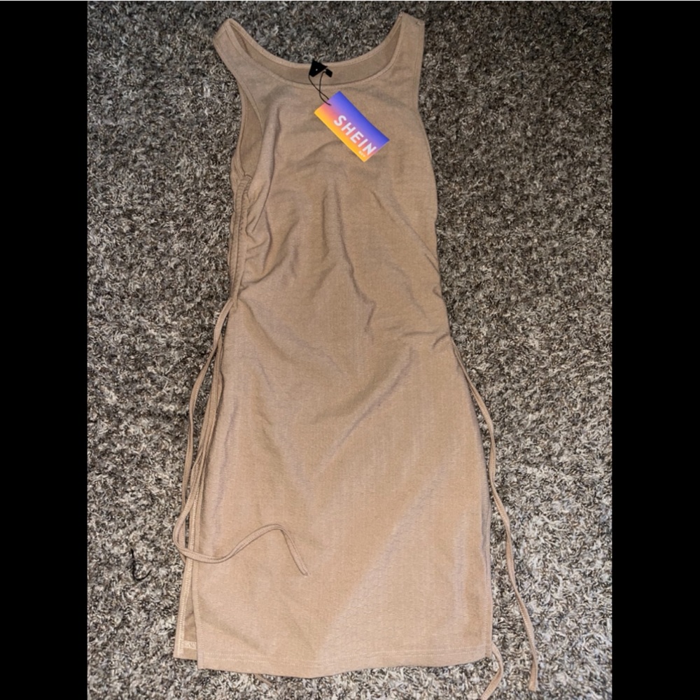 NEW W/ TAGS, I ordered the wrong size. Very cute!